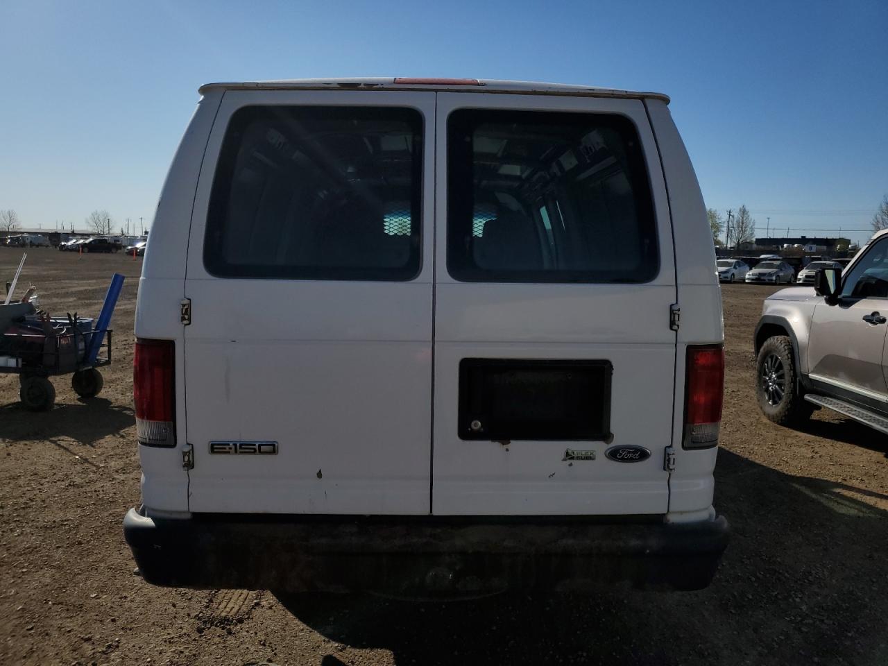 2009 Ford Econoline E150 Van VIN: 1FTNS14W69DA00238 Lot: 56038935