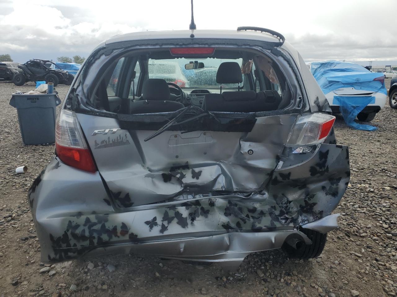 2009 Honda Fit VIN: JHMGE87299S003596 Lot: 56874375