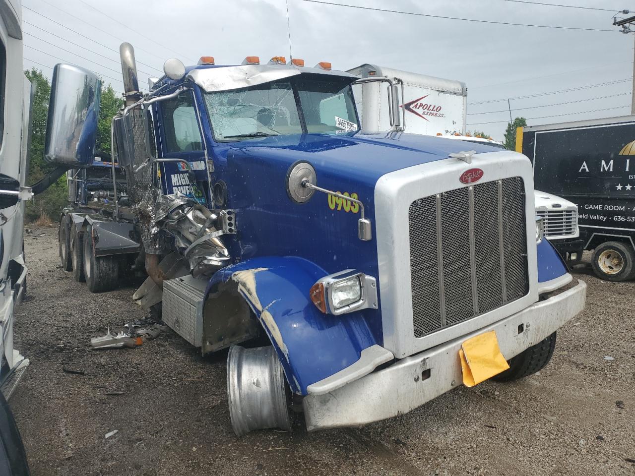 2009 Peterbilt 367 Roll-Off Container Truck იყიდება Bridgeton-ში, MO - Side