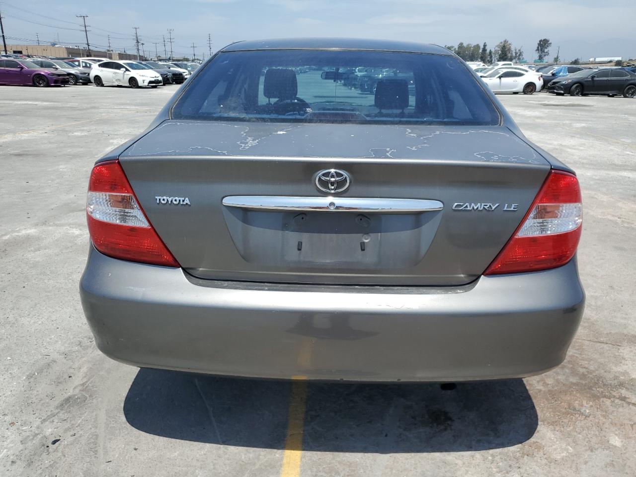 2003 Toyota Camry Le VIN: JTDBE32K630181023 Lot: 56789405