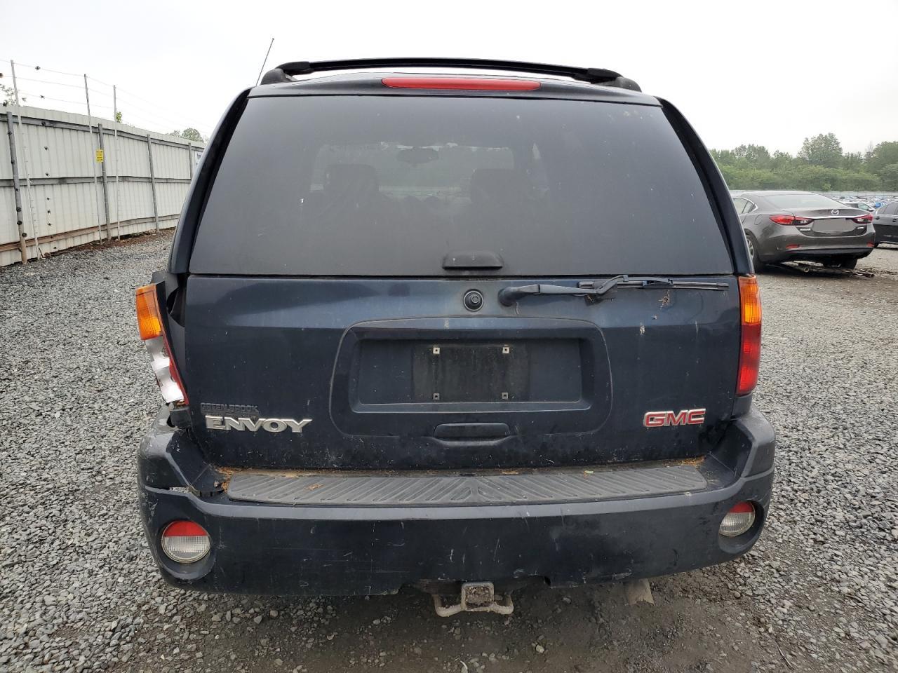 2003 GMC Envoy VIN: 1GKDT13S832352557 Lot: 56725915
