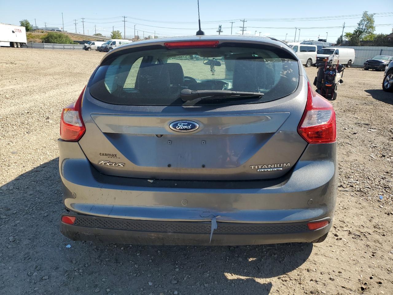 2014 Ford Focus Titanium VIN: 1FADP3N20EL264209 Lot: 57862025