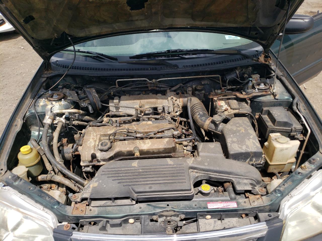 2000 Mazda Protege Dx VIN: JM1BJ2229Y0214674 Lot: 56354685