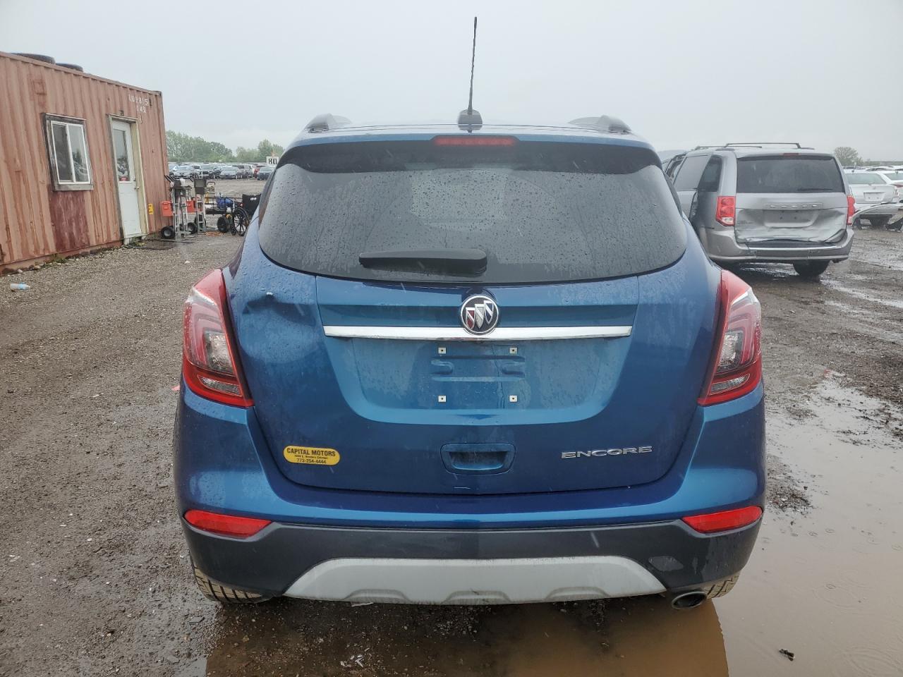 2019 Buick Encore Essence VIN: KL4CJCSM2KB954990 Lot: 58657185