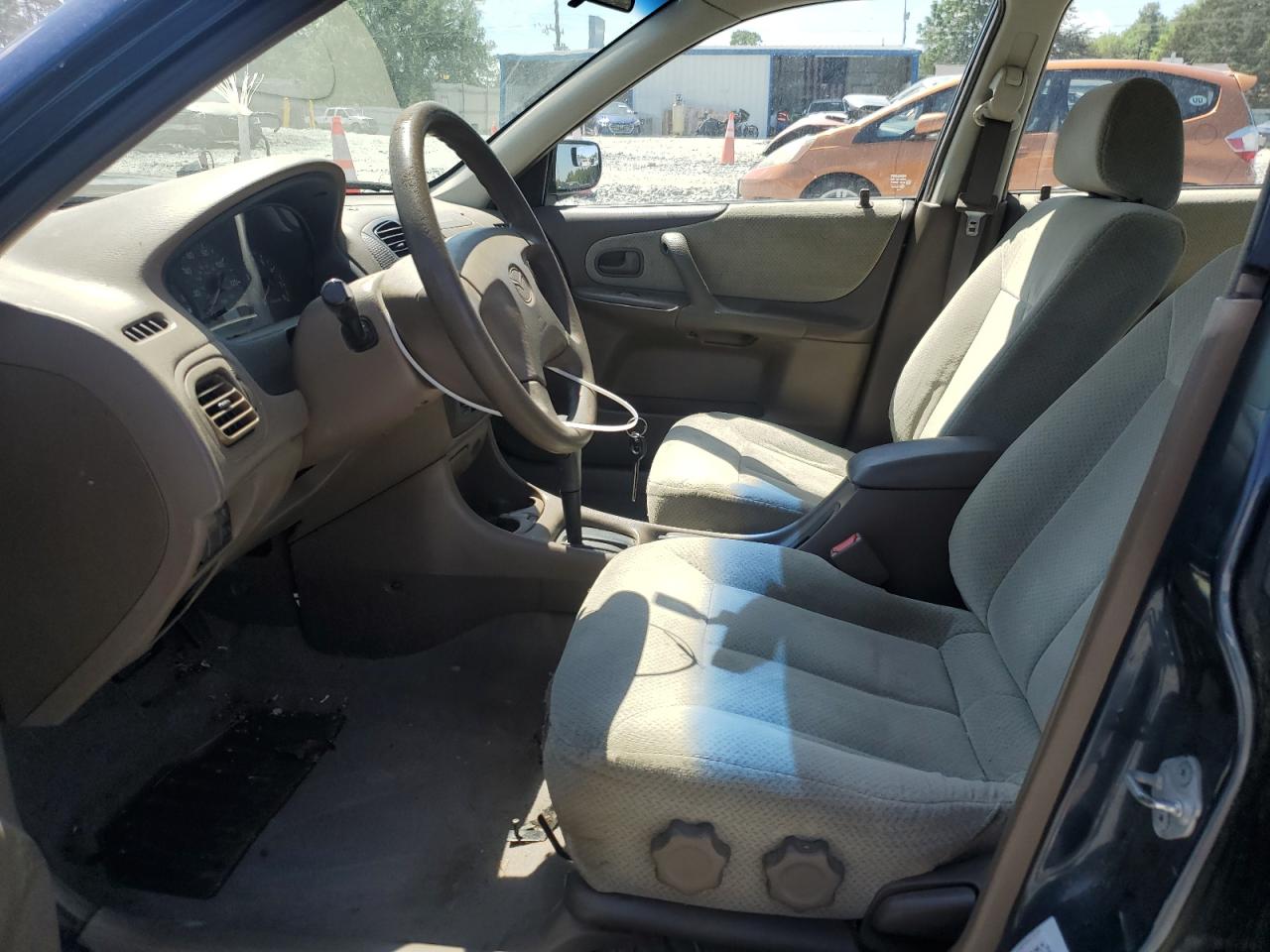 1999 Mazda Protege Dx VIN: JM1BJ2229X0137724 Lot: 55149115