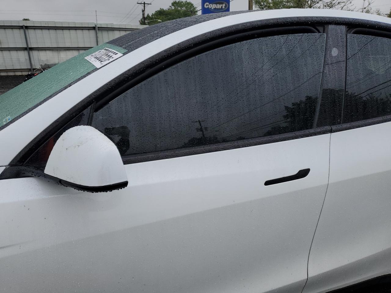 2023 Tesla Model Y VIN: 7SAYGDEEXPA158674 Lot: 57720555