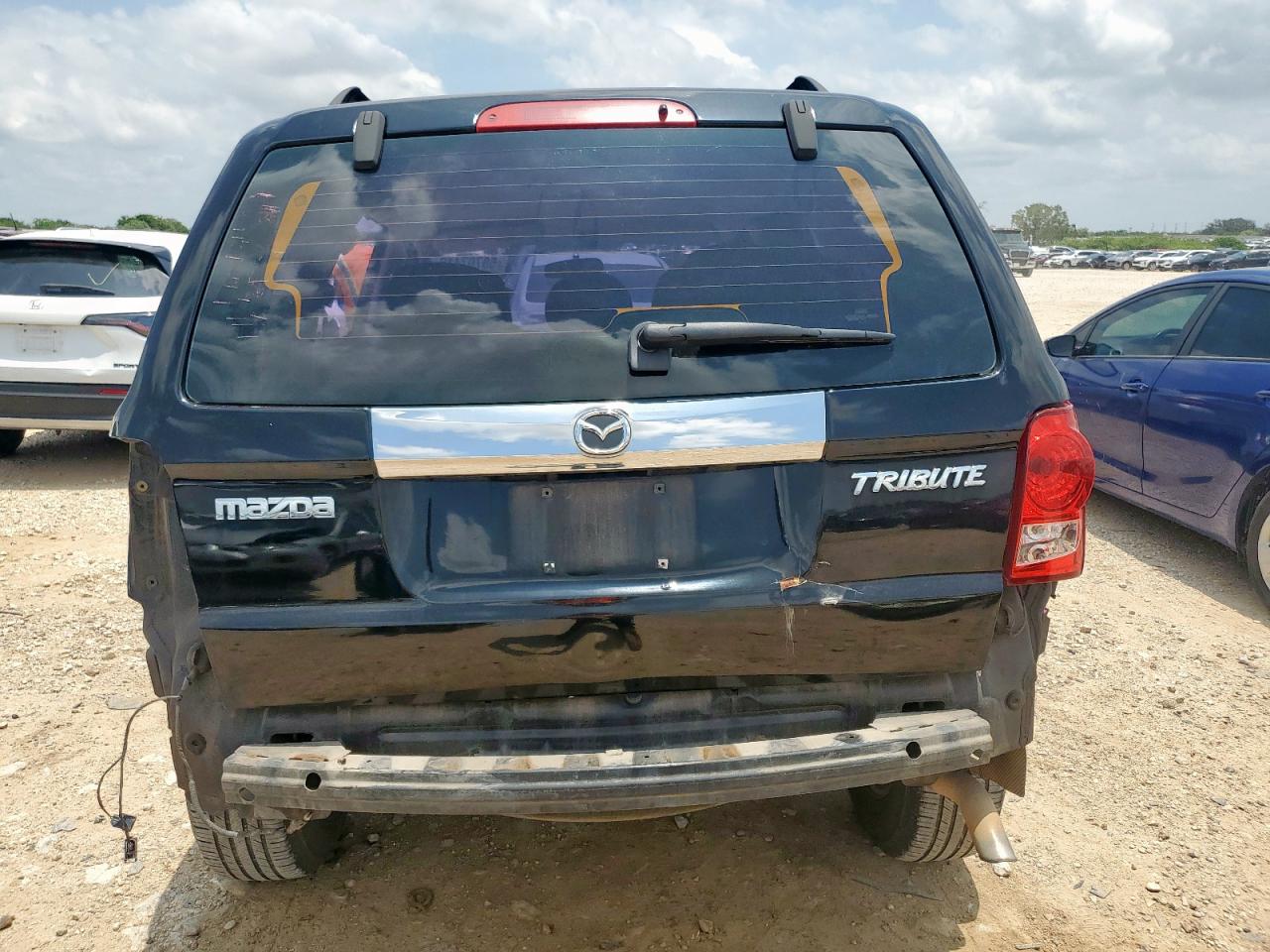 2009 Mazda Tribute I VIN: 4F2CZ027X9KM06642 Lot: 58707415