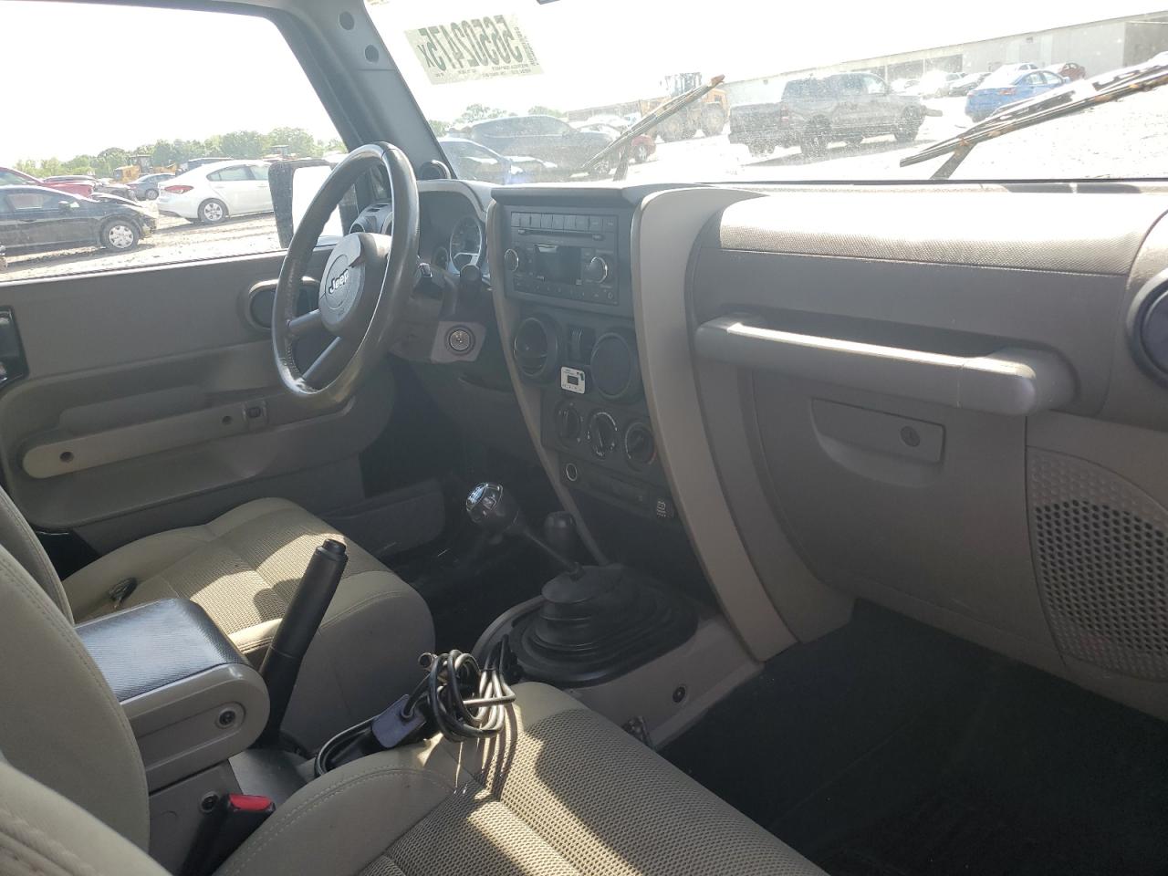 2007 Jeep Wrangler Sahara VIN: 1J8FA54137L209032 Lot: 56502475