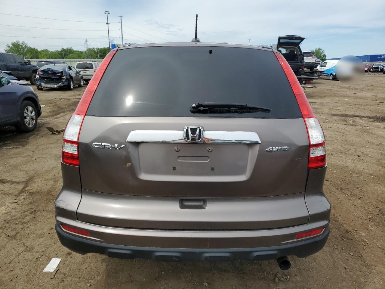 2010 Honda Cr-V Exl VIN: 5J6RE4H75AL099328 Lot: 59206915