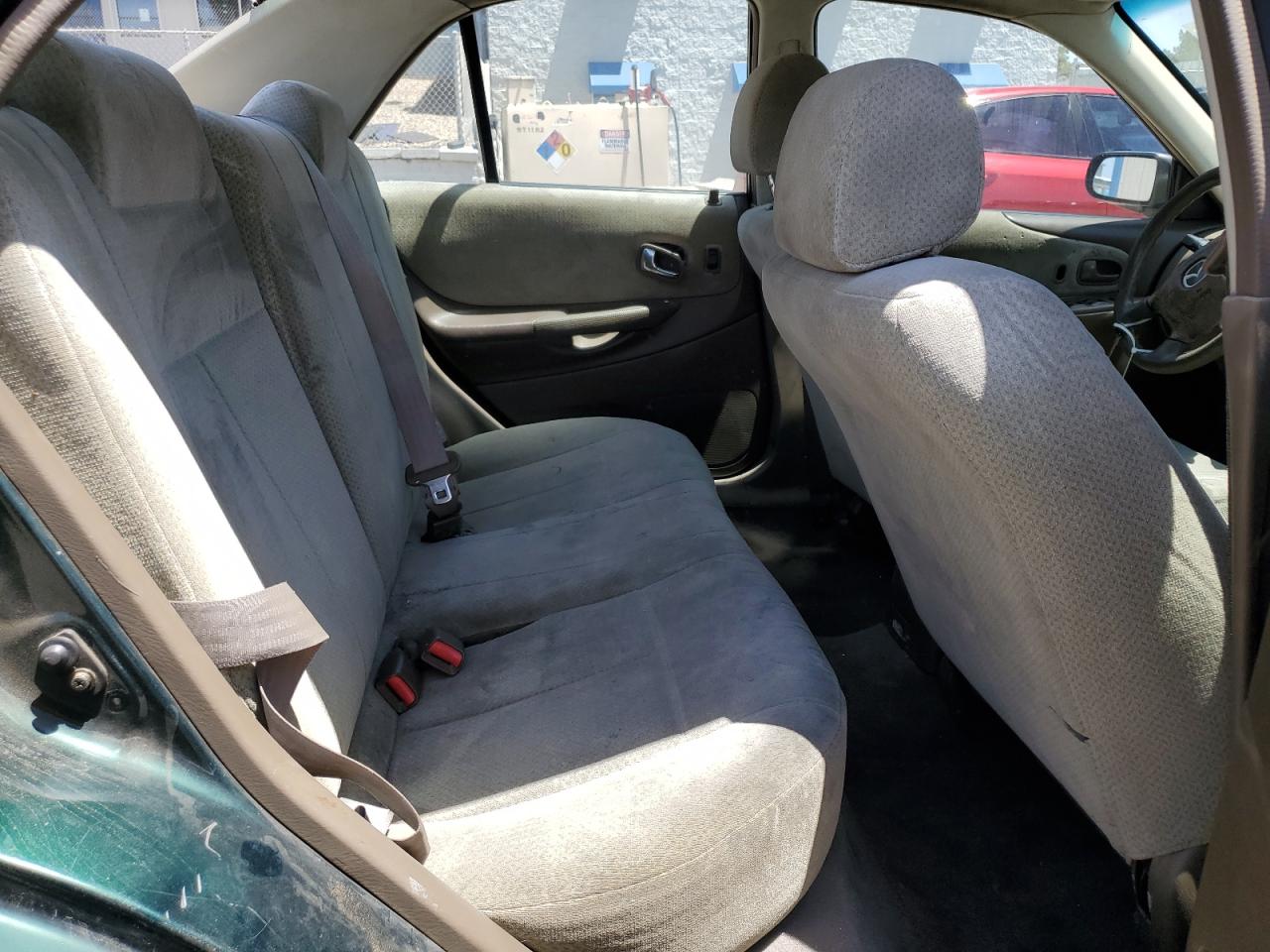 2000 Mazda Protege Dx VIN: JM1BJ222XY0275662 Lot: 57160195