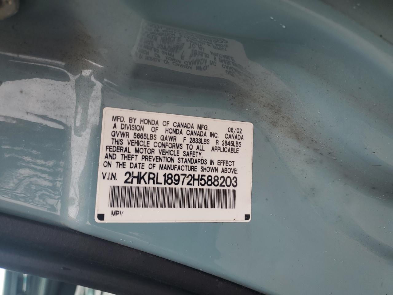 2002 Honda Odyssey Exl VIN: 2HKRL18972H588203 Lot: 56799955