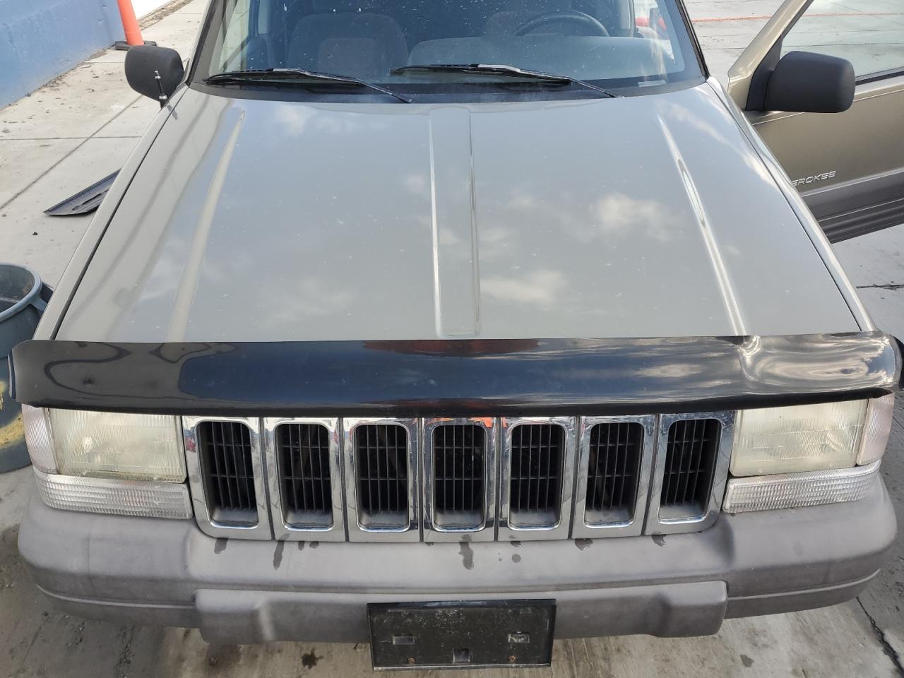 1996 Jeep Grand Cherokee Laredo VIN: 1J4GZ58S3TC245928 Lot: 57313735