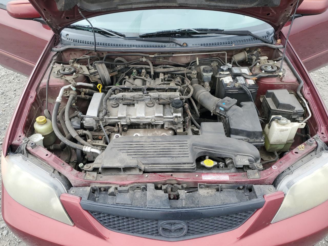 2002 Mazda Protege Dx VIN: JM1BJ225320636991 Lot: 57915265