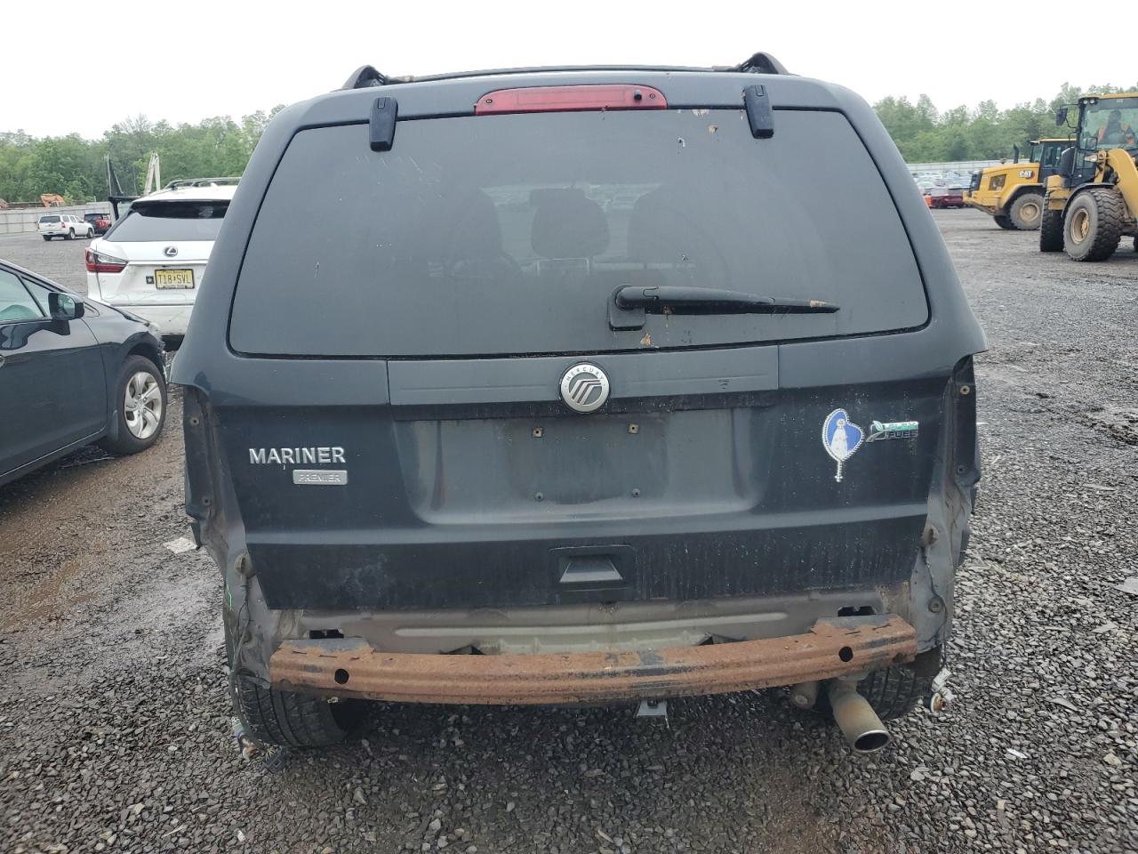 2011 Mercury Mariner Premier VIN: 4M2CN9HG1BKJ00209 Lot: 57016475