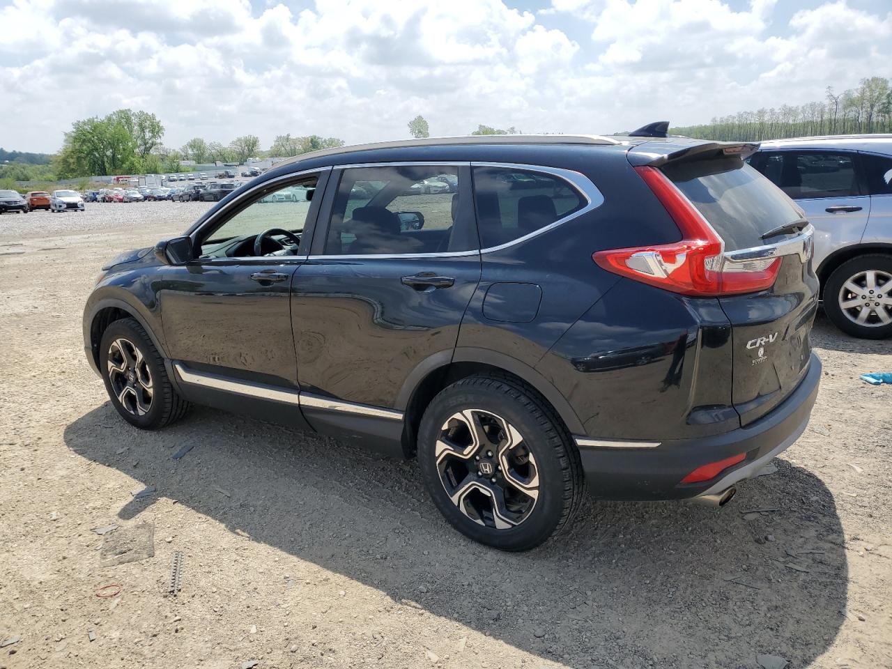 2017 Honda Cr-V Touring VIN: 5J6RW2H93HL066566 Lot: 56500075