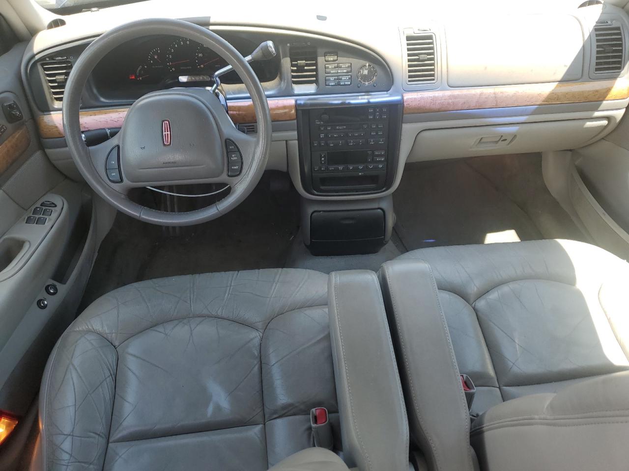 1998 Lincoln Continental VIN: 1LNFM97V2WY714576 Lot: 56664605