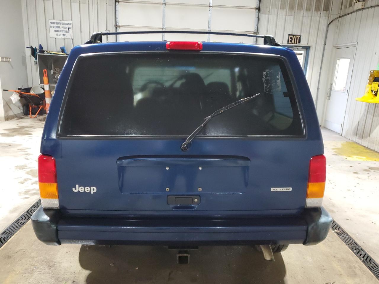 2001 Jeep Cherokee Sport VIN: 1J4FF48S11L594548 Lot: 56851085