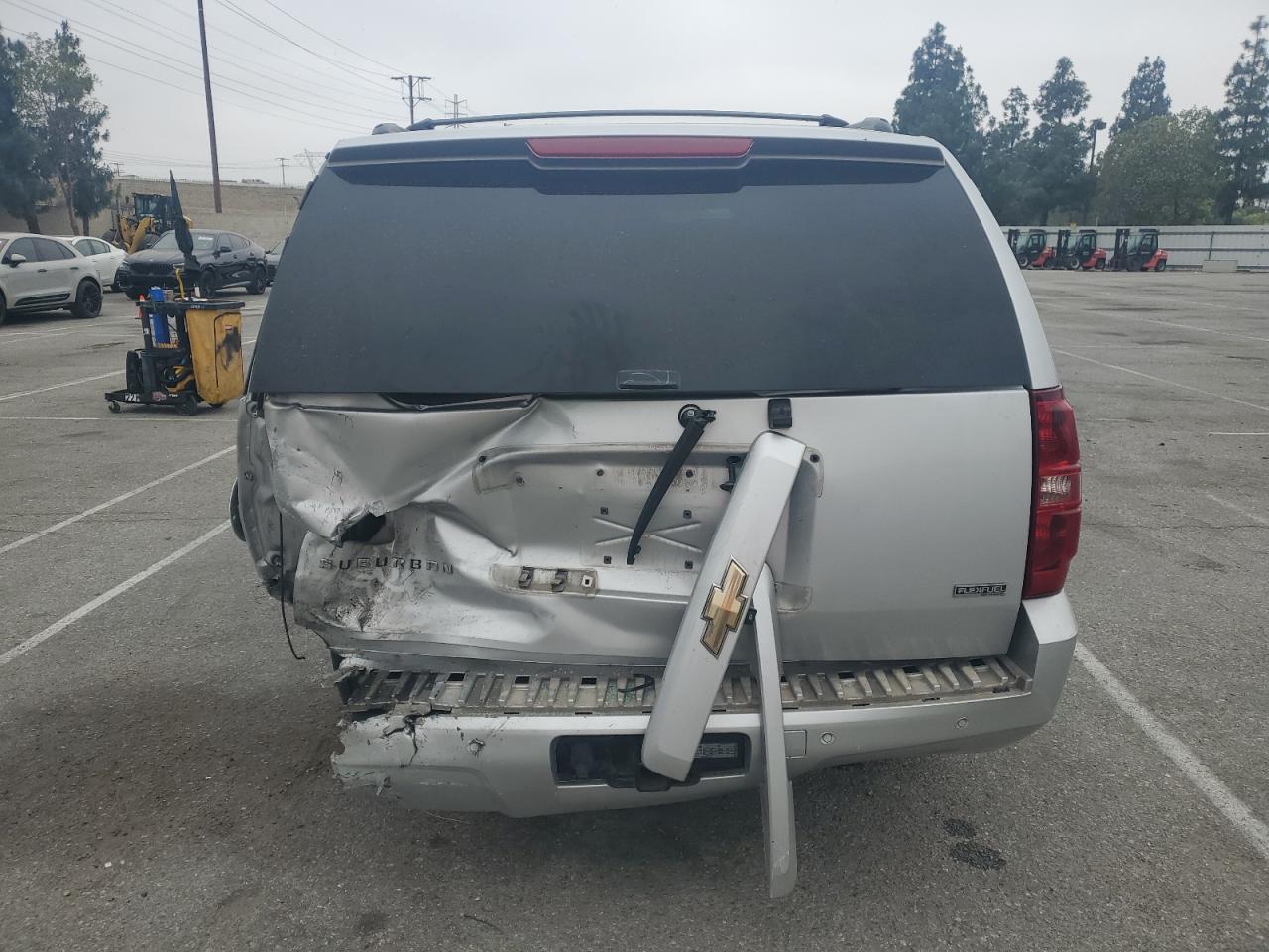 2011 Chevrolet Suburban C1500 Lt VIN: 1GNSCJE00BR225877 Lot: 58585895