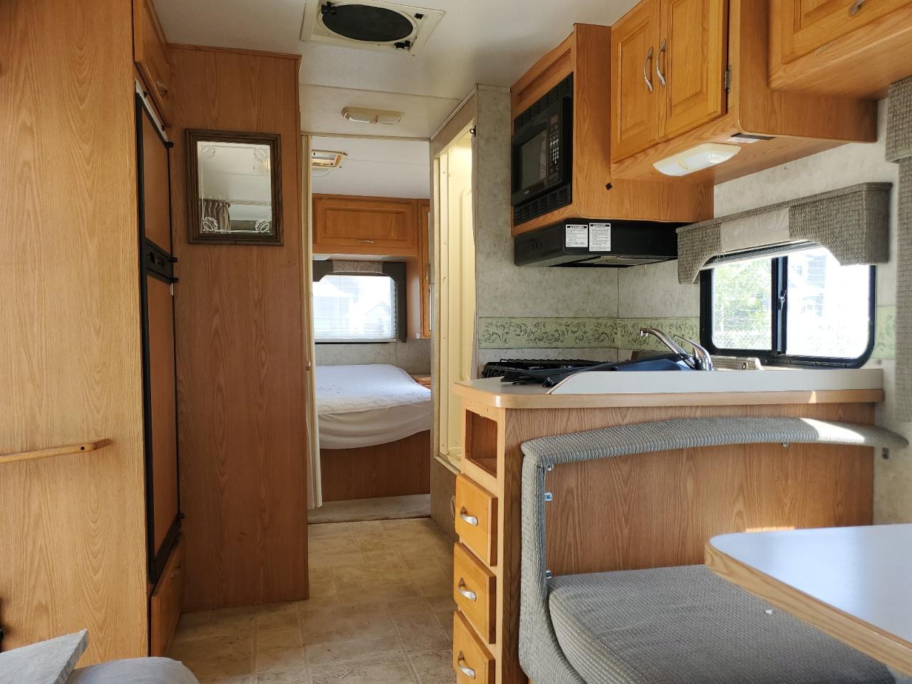 2004 Ford Econoline E450 Super Duty Cutaway Van VIN: 1FDXE45SX4HA78080 Lot: 56036935