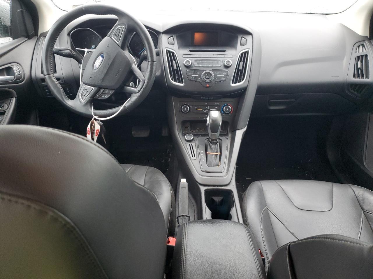 2015 Ford Focus Se VIN: 1FADP3F20FL214085 Lot: 56950985