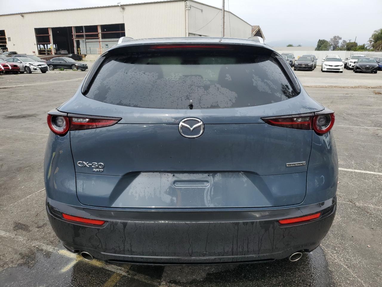 2025 MAZDA CX30 with FRONT END damage, VIN 3MVDMBCM5SM799059