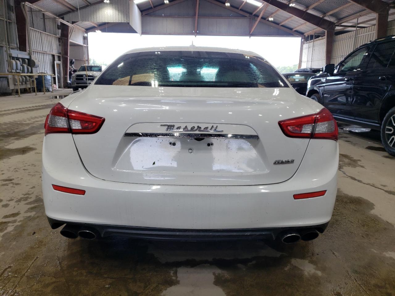 2014 Maserati Ghibli VIN: ZAM57XSA9E1090276 Lot: 55872705