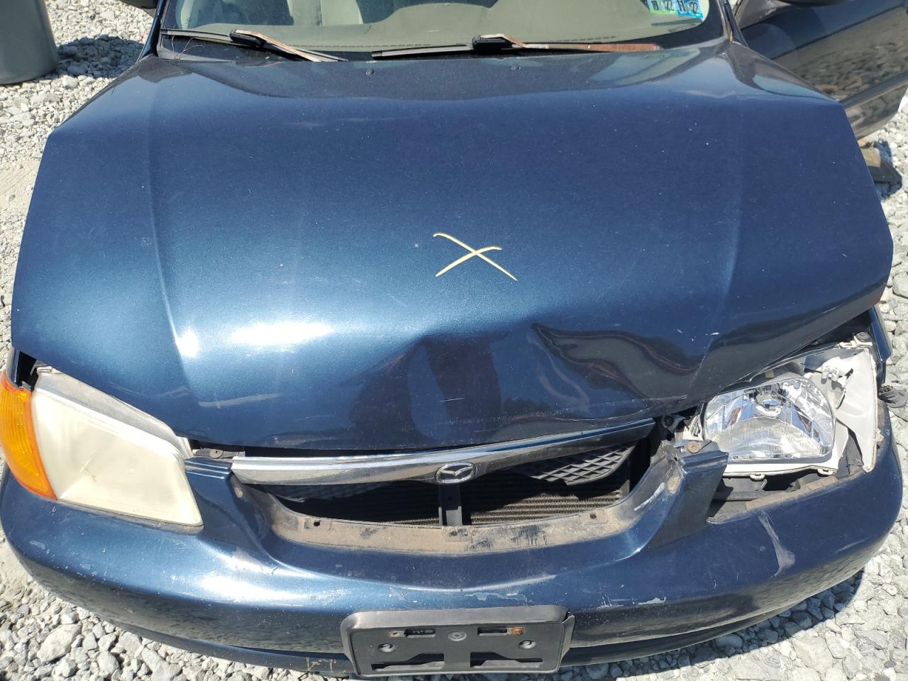 1999 Mazda Protege Dx VIN: JM1BJ2229X0137724 Lot: 55149115