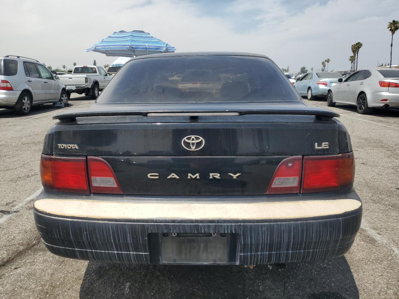 1995 Toyota Camry Le VIN: JT2SK12E4S0297738 Lot: 58627315