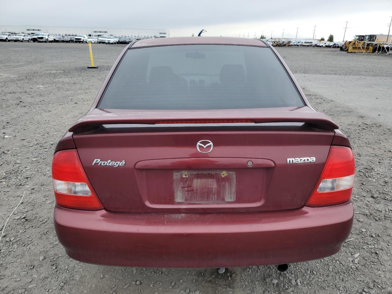2002 Mazda Protege Dx VIN: JM1BJ225320636991 Lot: 57915265