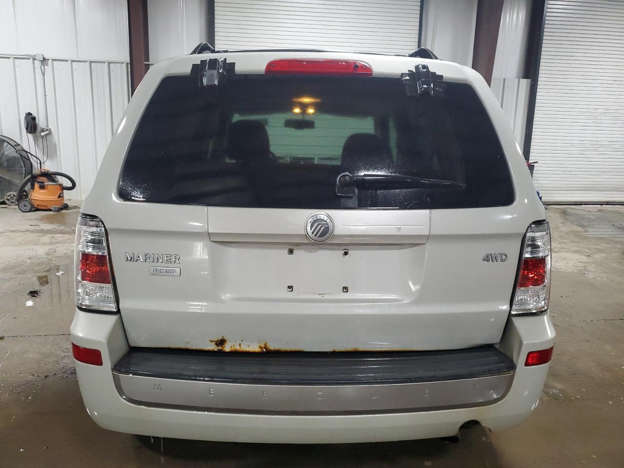 2009 Mercury Mariner Premier VIN: 4M2CU97G59KJ20381 Lot: 56682175