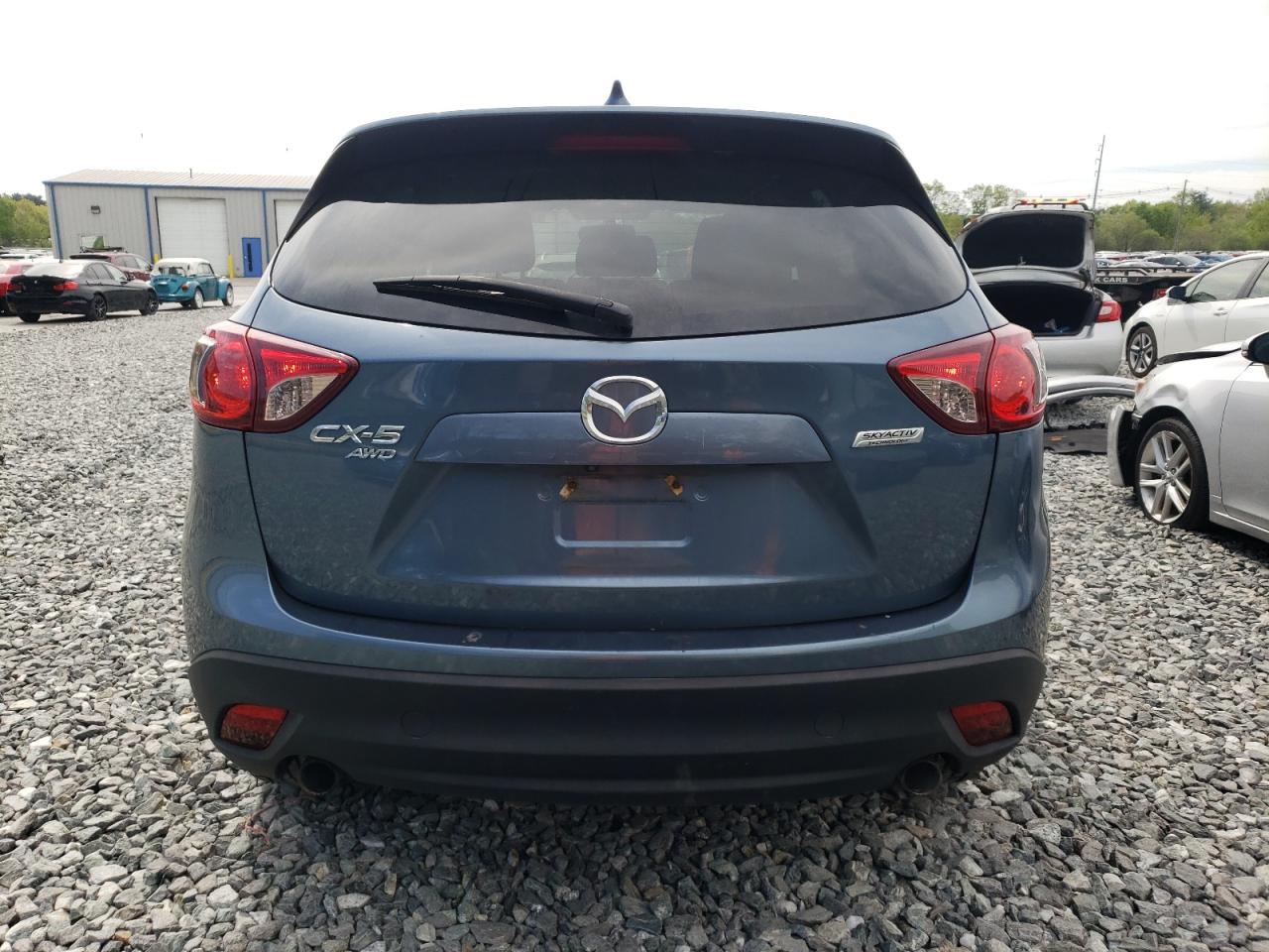 2015 Mazda Cx-5 Touring VIN: JM3KE4CYXF0542631 Lot: 56211245