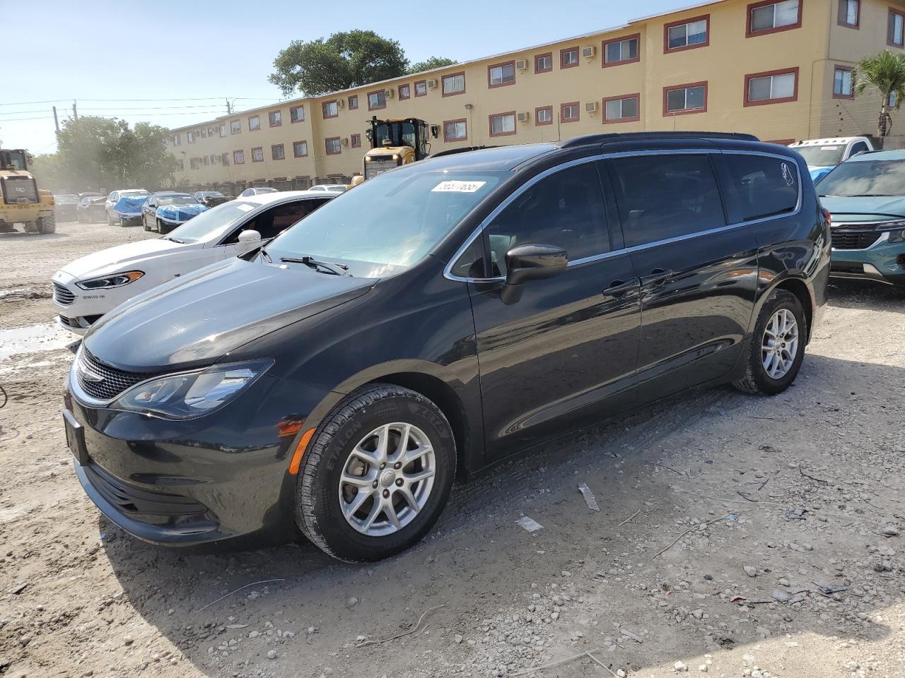 2020 Chrysler Voyager Lxi for Sale in Opa Locka, FL - Side