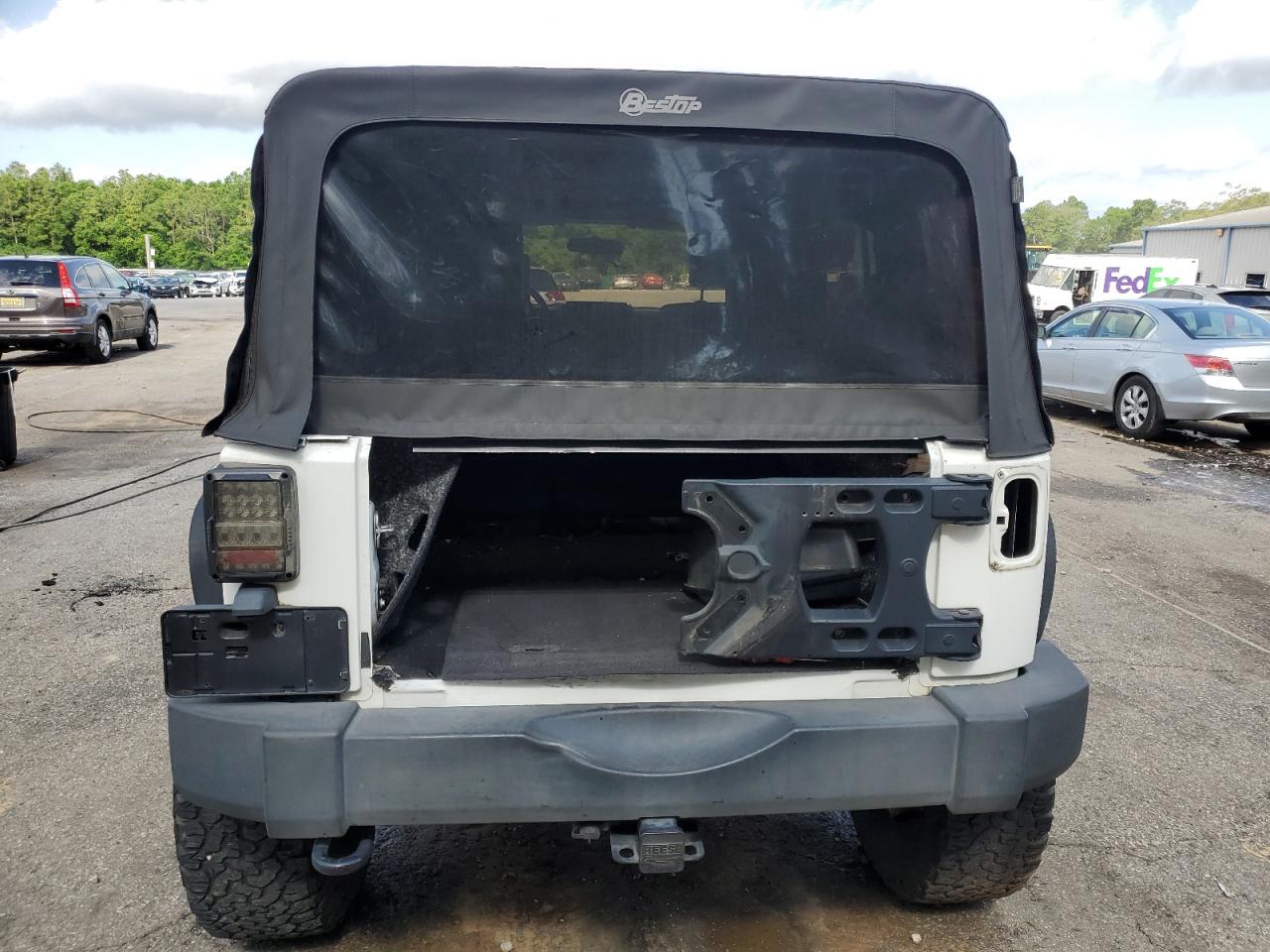 2010 Jeep Wrangler Unlimited Rubicon VIN: 1J4BA6H10AL176014 Lot: 57092255