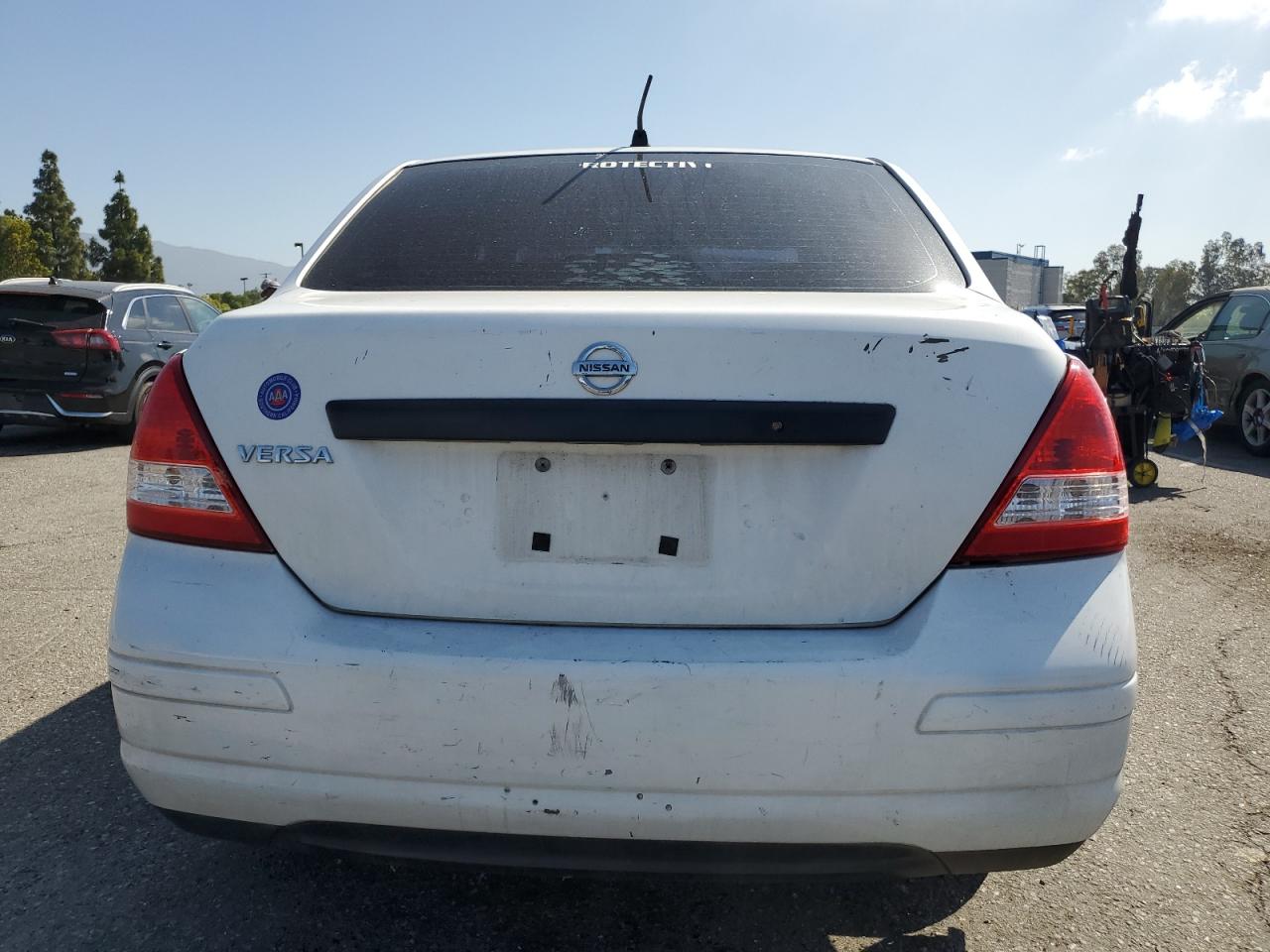 2009 Nissan Versa S VIN: 3N1CC11E39L454248 Lot: 57123485