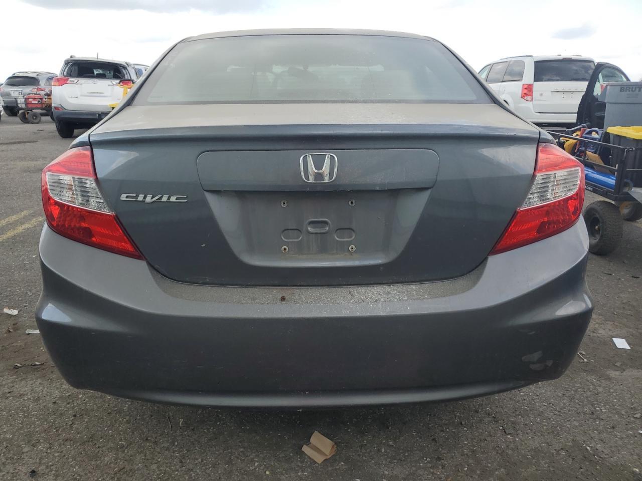 2012 Honda Civic Lx VIN: 19XFB2F55CE387286 Lot: 55558575