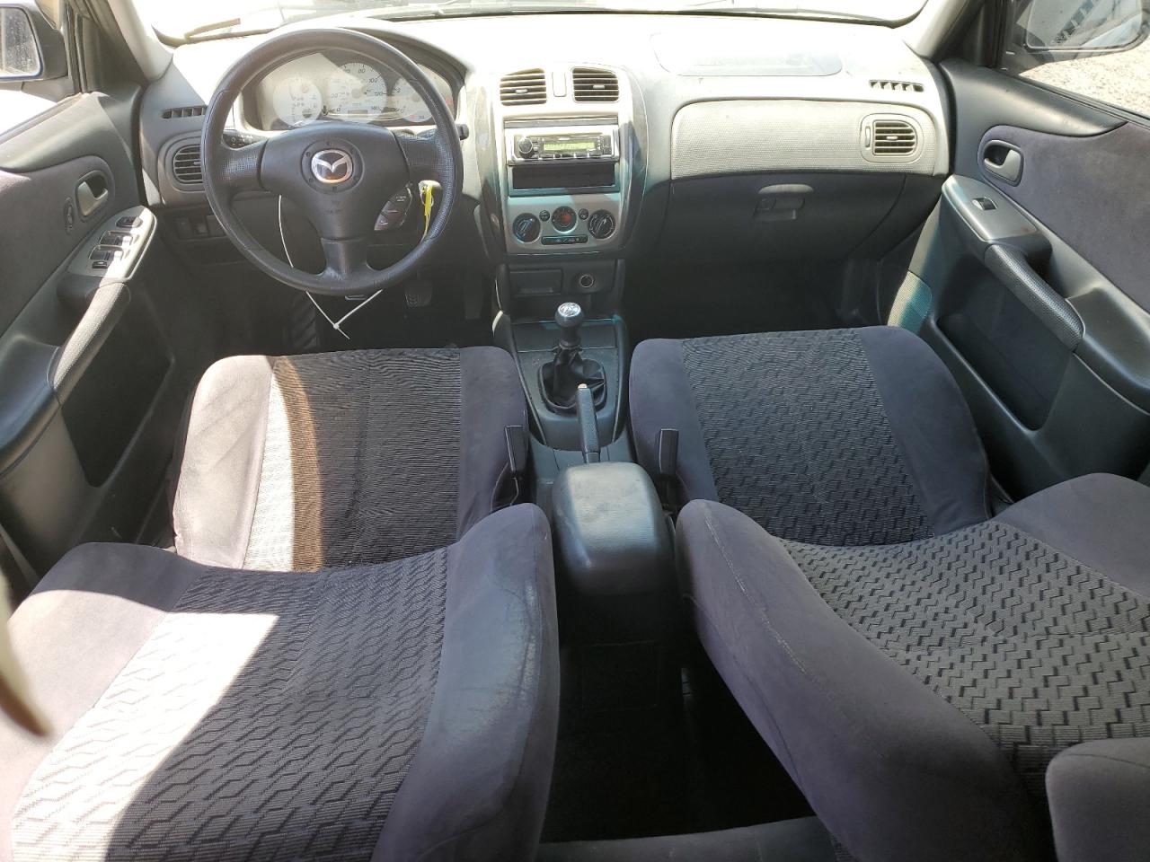 2002 Mazda Protege Dx VIN: JM1BJ225320541640 Lot: 56980435