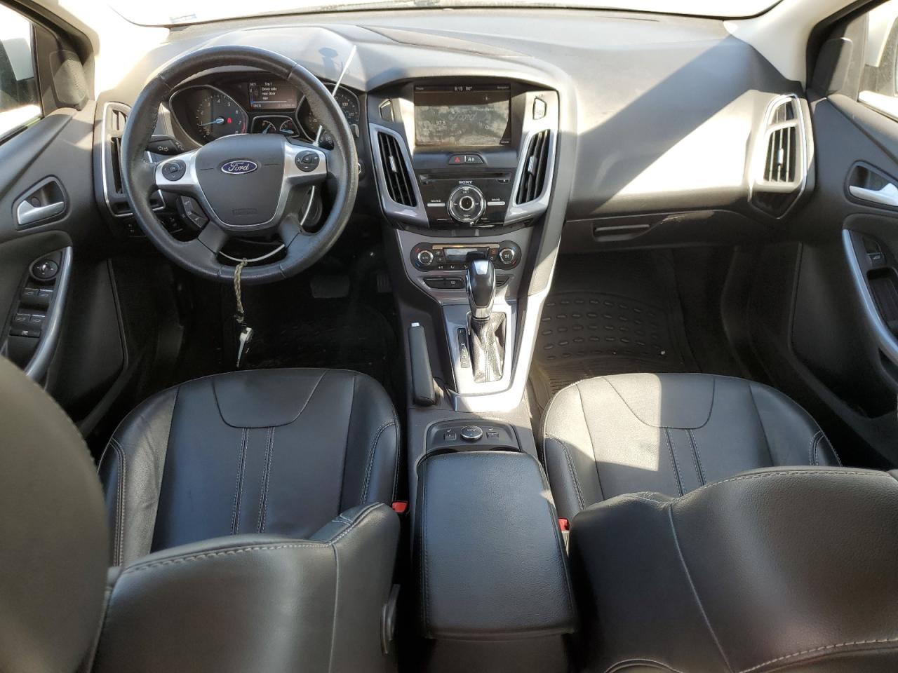 2014 Ford Focus Titanium VIN: 1FADP3J20EL199447 Lot: 54268465