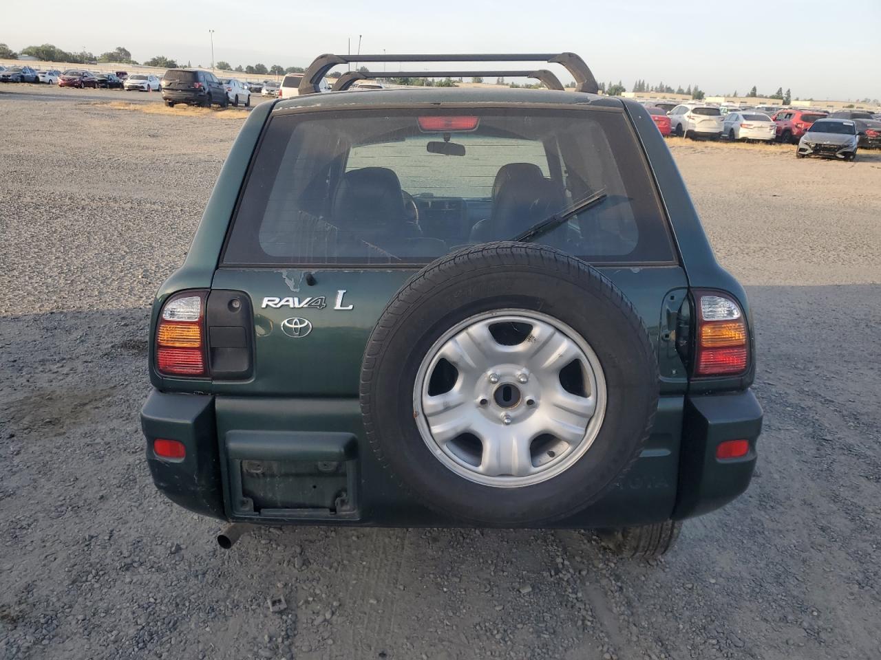 1999 Toyota Rav4 VIN: JT3GP10V5X7058381 Lot: 57288235