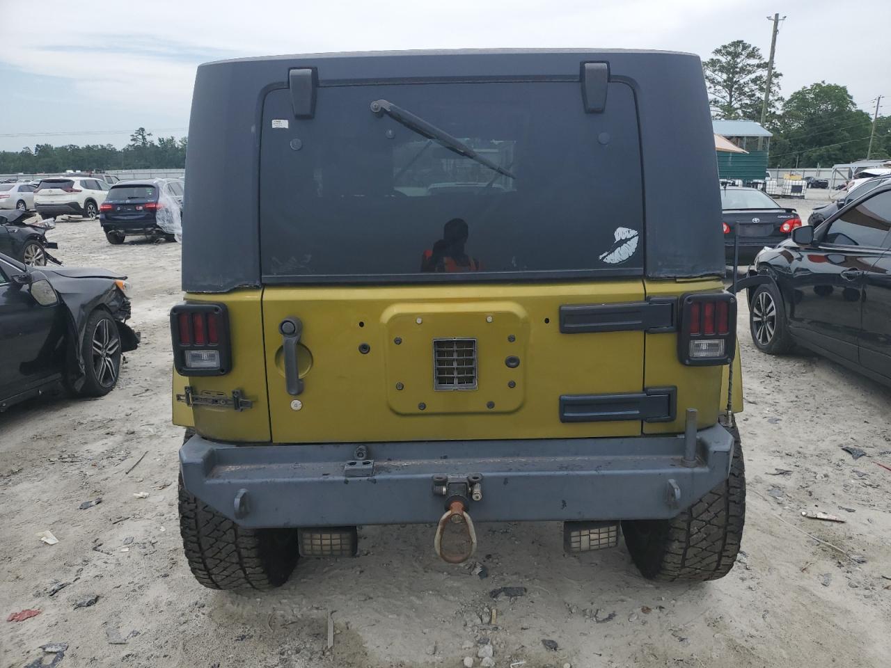 2007 Jeep Wrangler Sahara VIN: 1J4FA54177L216468 Lot: 56986853