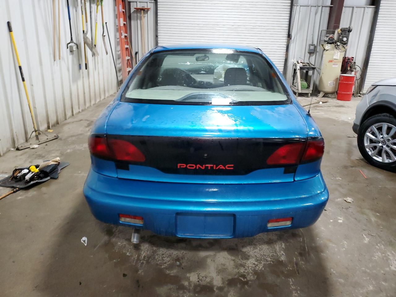 1998 Pontiac Sunfire Se VIN: 3G2JB5243WS833731 Lot: 61456124