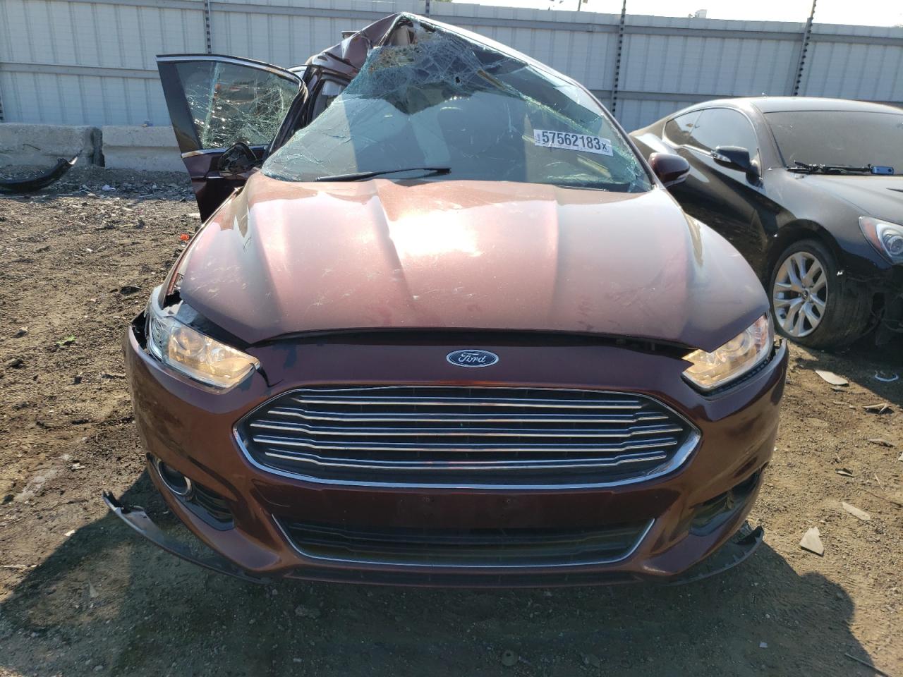 2016 Ford Fusion Titanium VIN: 3FA6P0K92GR400577 Lot: 64830004