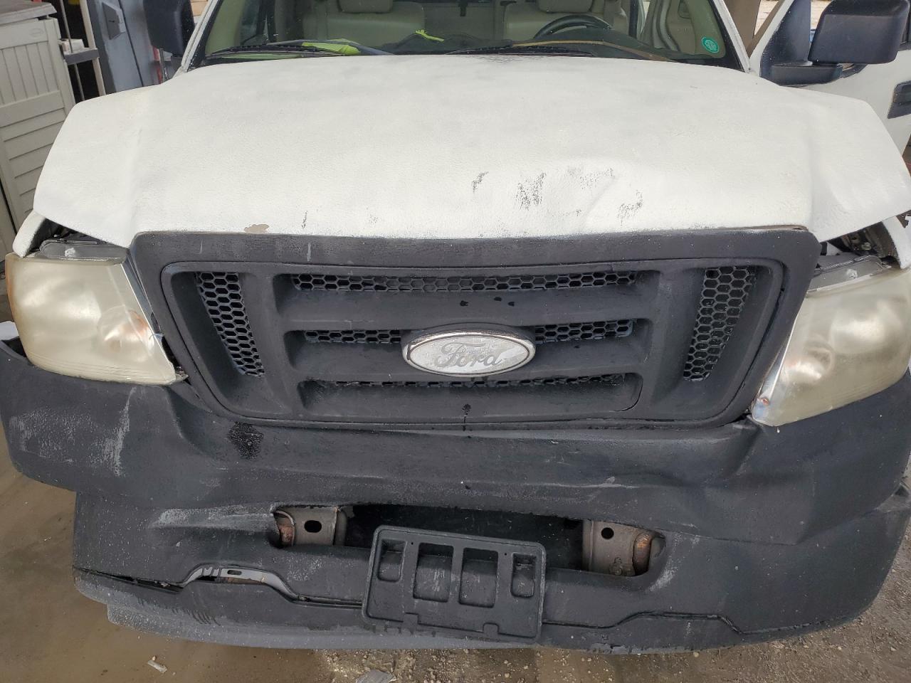 2007 Ford F150 VIN: 1FTRF12217NA23715 Lot: 58898354