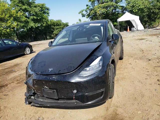 2023 Tesla Model Y VIN: 7SAYGDEE7PA150872 Lot: 59995814