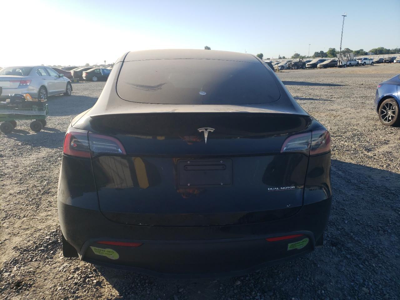 2023 Tesla Model Y VIN: 7SAYGDEF6PF746163 Lot: 57926014