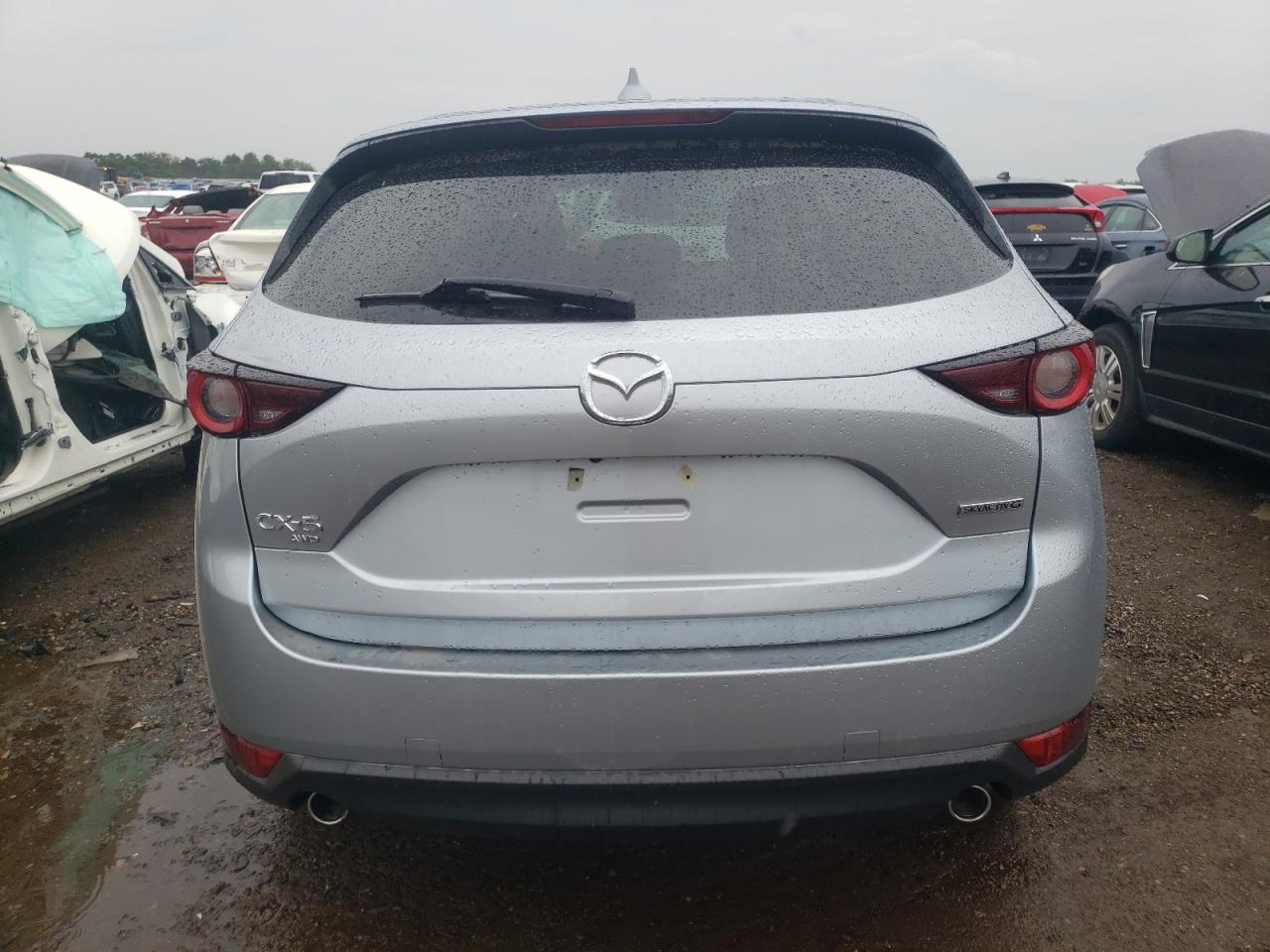 2021 Mazda Cx-5 Touring VIN: JM3KFBCM7M0407831 Lot: 60757814