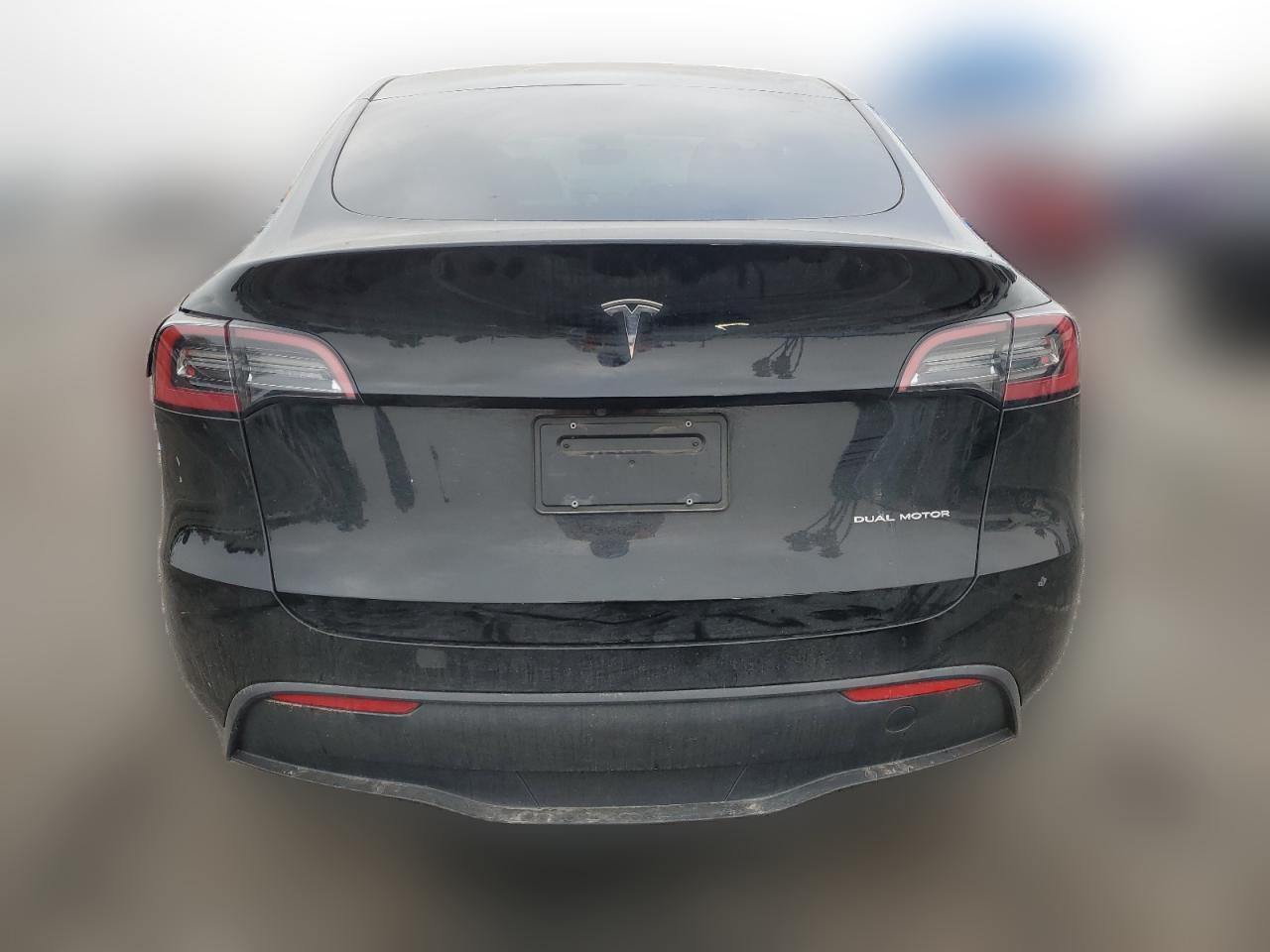 2023 Tesla Model Y VIN: 7SAYGDEE0PA105286 Lot: 38593414