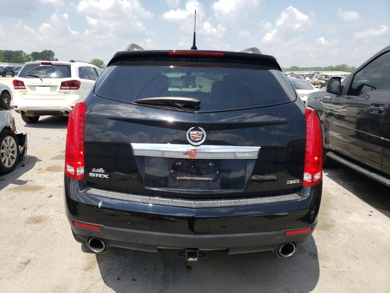 2014 Cadillac Srx VIN: 3GYFNAE33ES613681 Lot: 59303024