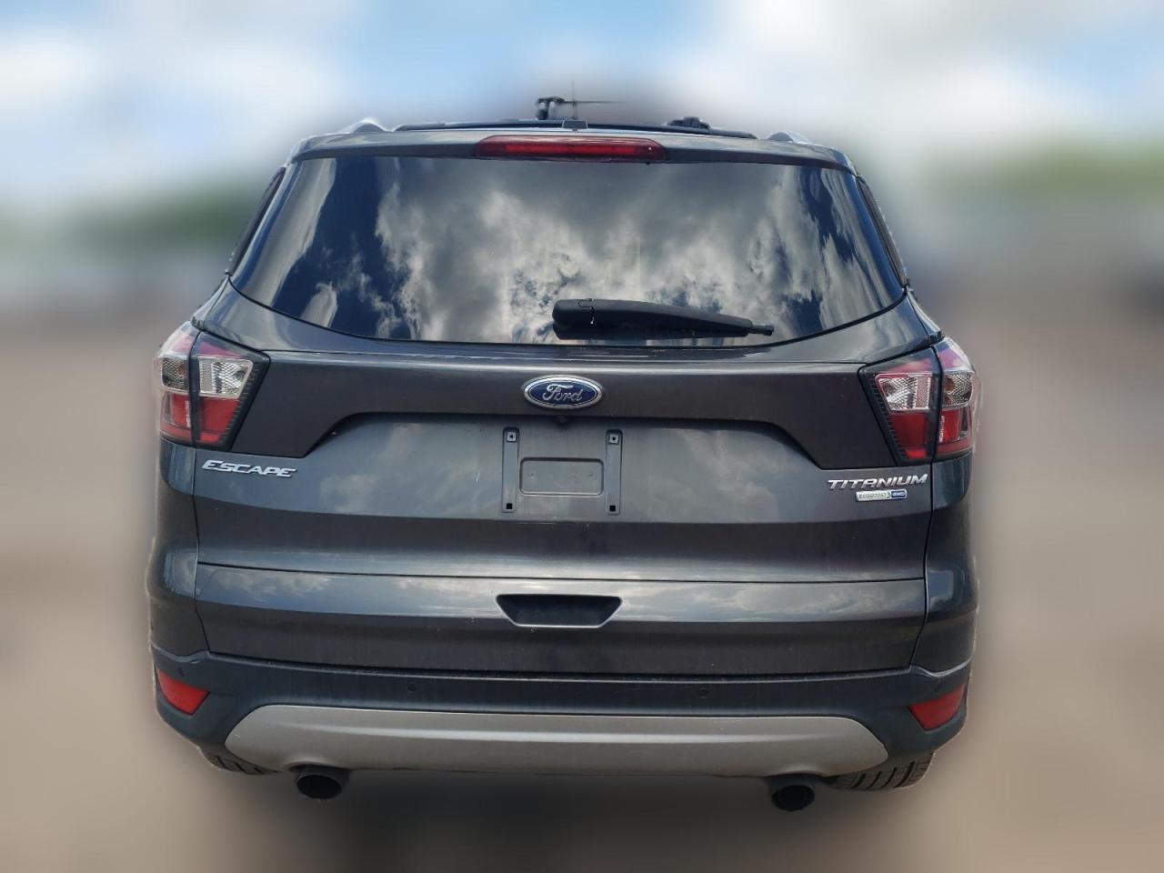 2017 Ford Escape Titanium VIN: 1FMCU9J9XHUA86887 Lot: 60154314