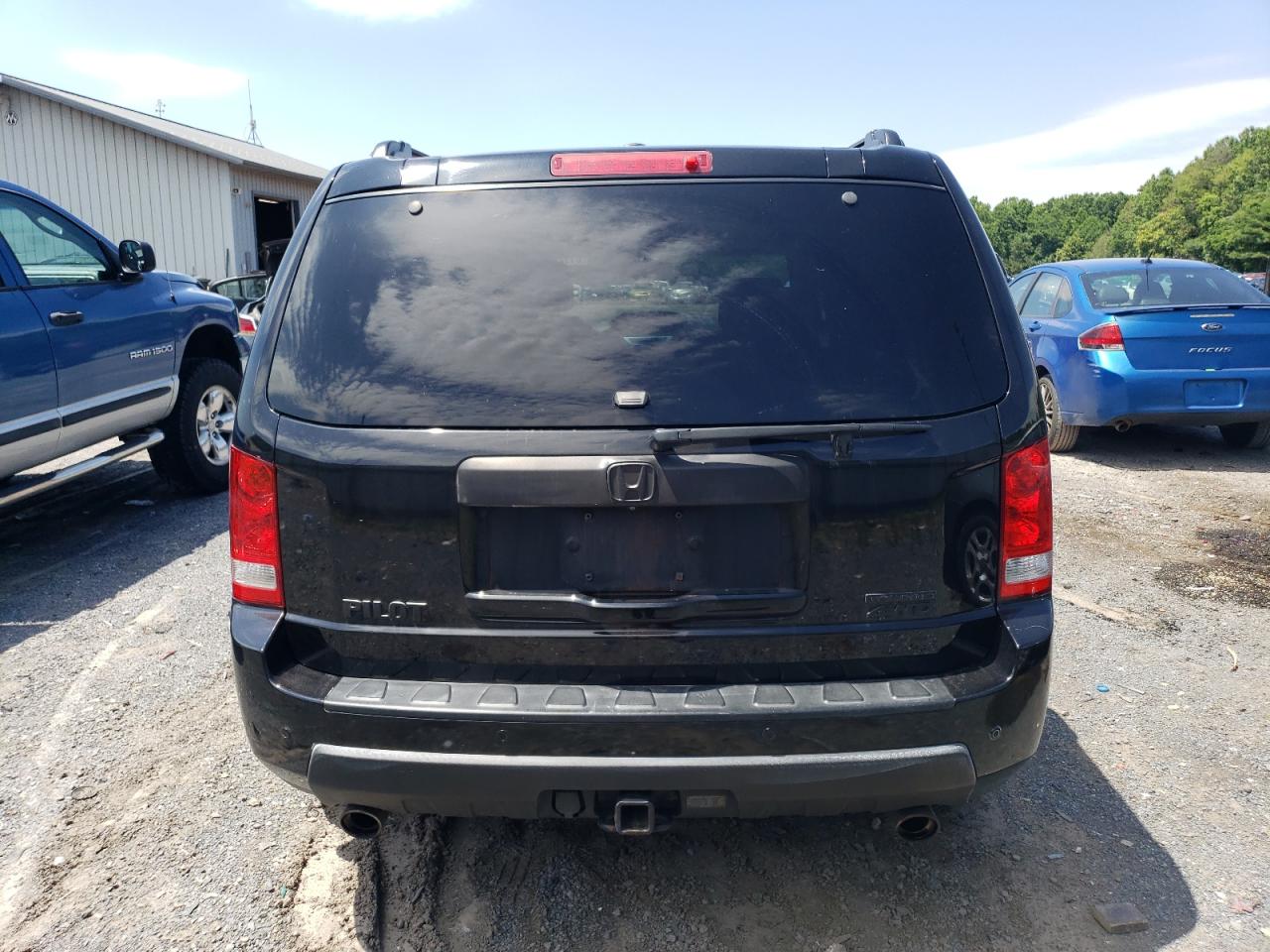 2011 Honda Pilot Touring VIN: 5FNYF4H90BB080450 Lot: 61129994