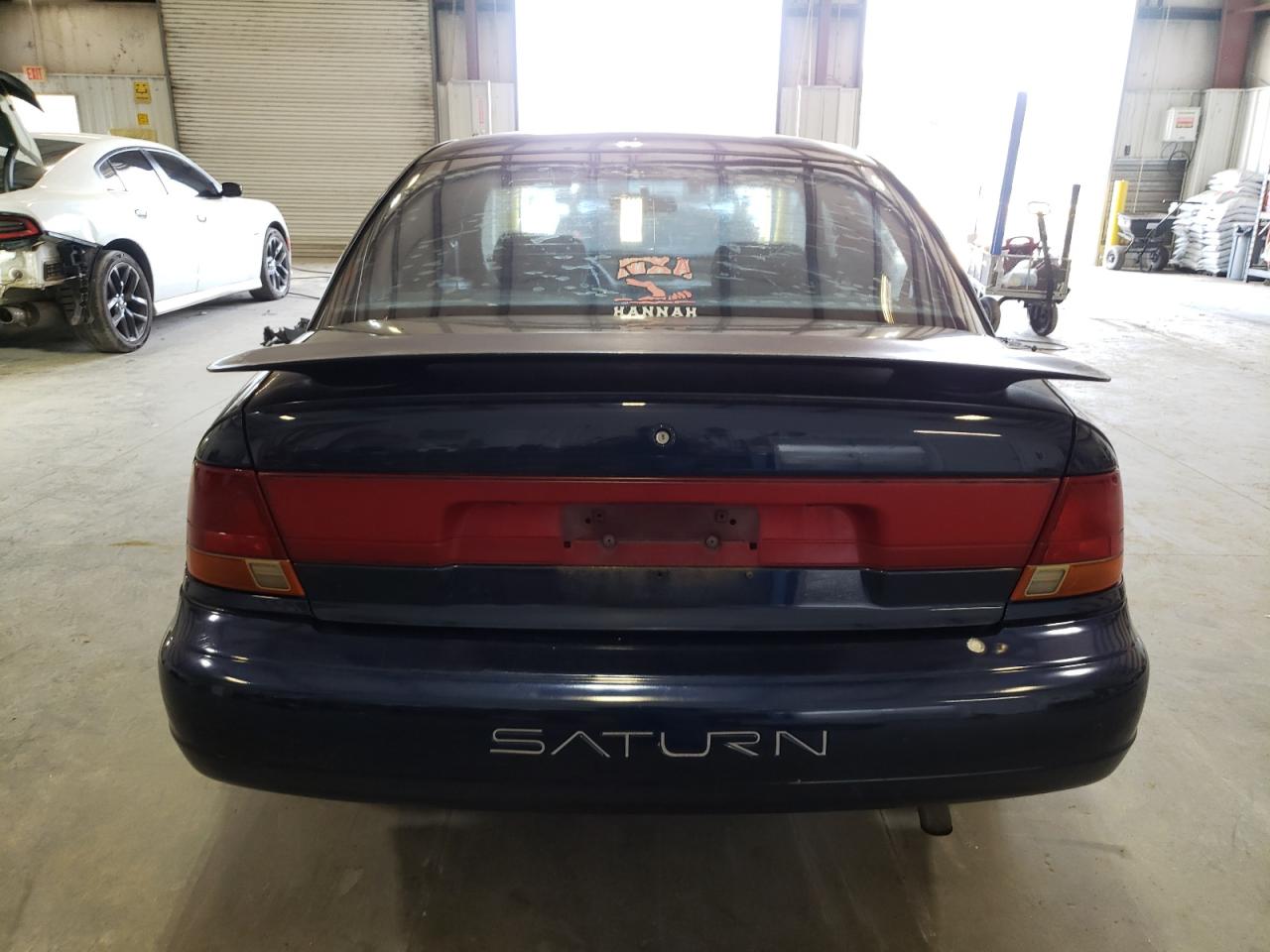 1999 Saturn Sl2 VIN: 1G8ZK5275XZ258278 Lot: 60052394